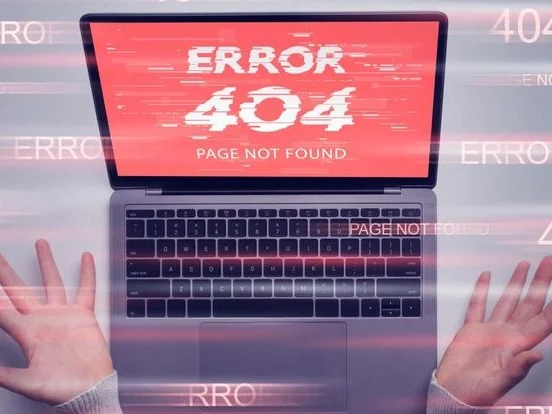 Laptop showing a 404 page not found error