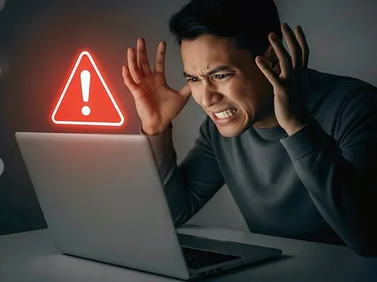 Illustration of a frustrated viewer facing a laptop warning sign