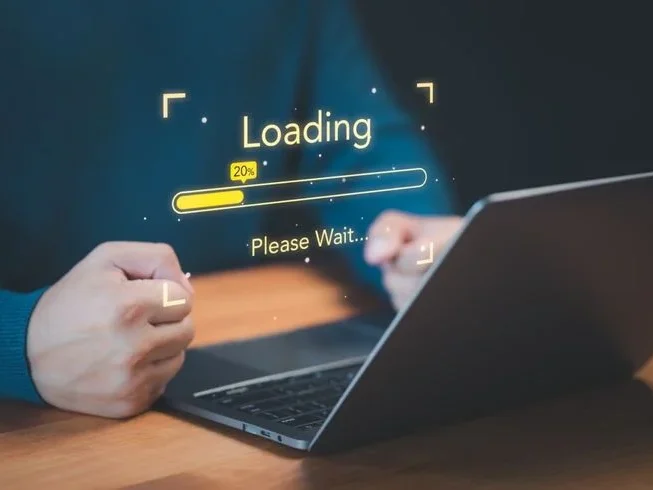 Laptop on a desk with a loading progress bar overlay at 20 percent